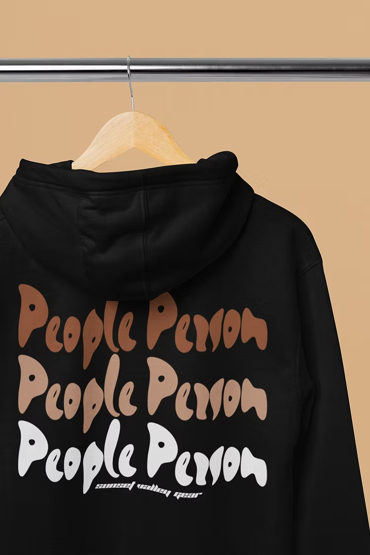 Black hoodie with 'People Person' text on a beige background